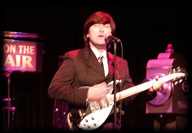 Shaun Friedrichs as John Lennon