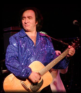 NEIL DIAMOND (Tom Sadge) opens the show with Cherry Cherry, Cracklin' Rosie, and Sweet Caroline