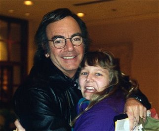 Juli gets a hug from Neil Diamond. 2-12-96